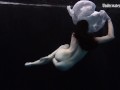 Aqua girl Andrejka underwater stripping and swimming