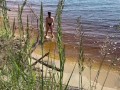 Sexy nudist girl on a wild beach