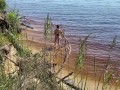 Sexy nudist girl on a wild beach