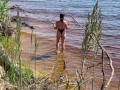 Sexy nudist girl on a wild beach