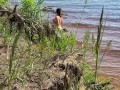 Sexy nudist girl on a wild beach