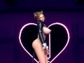 Sexy idol in super micro V cat suit with tail anal plug hot dancing on the club stage