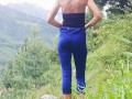 Slim fitness girl in yoga pants pissing Outdoor - Angel Fowler pees in mountains 