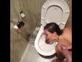 human toilet waiting for me to piss all over her face next to the toilet at the hotel
