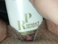 Bunni Stretching with thick conditioner bottle