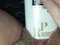 Bunni Stretching with thick conditioner bottle