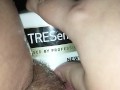 Bunni Stretching with thick conditioner bottle