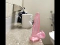 Dildo in anal in public toilet