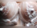 Watch me rub my big wet tits with soap 