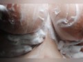 Watch me rub my big wet tits with soap 