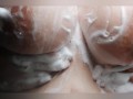 Watch me rub my big juicy tits in the shower