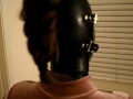Bondage Girl Gagged in Latex Hood
