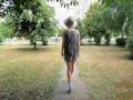 Slut walks in a mini dress with a fully transparent skirt