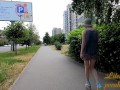Slut walks in a mini dress with a fully transparent skirt