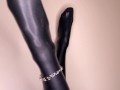 The nice shy girl has a special latex surprise