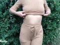 Alice in a beige suit sits in a bar walking down the street and posing near the mirror showing tits