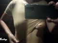 Alice in a beige suit sits in a bar walking down the street and posing near the mirror showing tits