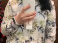 Pregnant beauty masturbates in a clothing store and tries on dresses