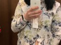 Pregnant beauty masturbates in a clothing store and tries on dresses