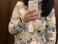 Pregnant beauty masturbates in a clothing store and tries on dresses