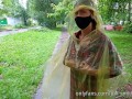 Risky flash of boobs and butt in the rain in a transparent raincoat