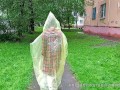 Risky flash of boobs and butt in the rain in a transparent raincoat