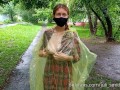 Risky flash of boobs and butt in the rain in a transparent raincoat