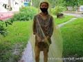 Risky flash of boobs and butt in the rain in a transparent raincoat