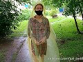 Risky flash of boobs and butt in the rain in a transparent raincoat