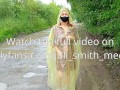 Risky flash of boobs and butt in the rain in a transparent raincoat