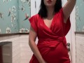 Hot brunette in red dress masturbates in a public restaurant