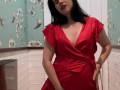 Hot brunette in red dress masturbates in a public restaurant