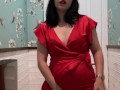 Hot brunette in red dress masturbates in a public restaurant