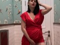 Hot brunette in red dress masturbates in a public restaurant