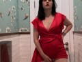 Hot brunette in red dress masturbates in a public restaurant