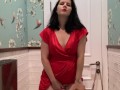 Hot brunette in red dress masturbates in a public restaurant