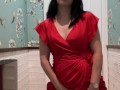 Hot brunette in red dress masturbates in a public restaurant