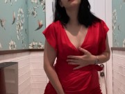 Hot brunette in red dress masturbates in a public restaurant