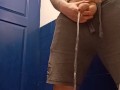 Hung jock loud piss in the gym toilet