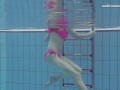 Pink swimswear babe Lera showing naked body underwater