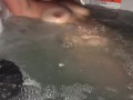 Sneak peak of my wife’s tits in our backyard hot tub tonight