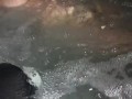 Sneak peak of my wife’s tits in our backyard hot tub tonight