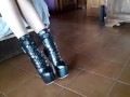 Laura is wearing miniskirt, stockings and 8 inches high heels