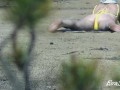 Mom undresses on the beach thinking that no one sees her