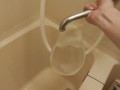 Put a condom on the faucet and fill it with water. And the condom bursts!!