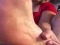 Chubby MILF plays with her spit and toes