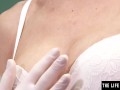 Kinky nurse makes her pussy gape with a speculum as she orgasms