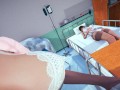 Doctor Fingering Nurse in Front of Patient At Hospital Room