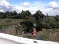 Naked girl on the bridge