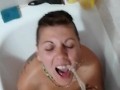 Pissing on girlfriend while she was sitting a bathtub